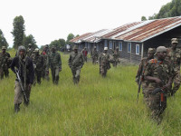 M23 rebels take position near the town of Mutaho, in eastern Democratic Republic of Congo